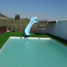 Poliéster Humilladero piscina con tobogan